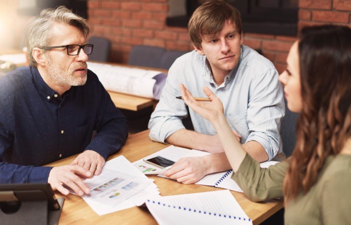 group-creative-people-analyzing-result-work