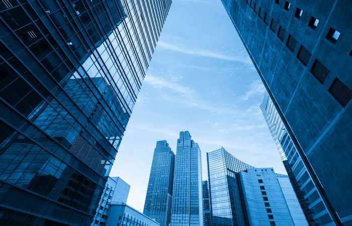 Looking Up Blue Modern Office Building